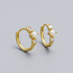 Gold hoop earrings with pearls and small crystals 