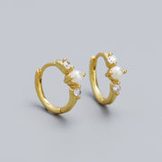 Gold hoop earrings with pearls and small crystals 